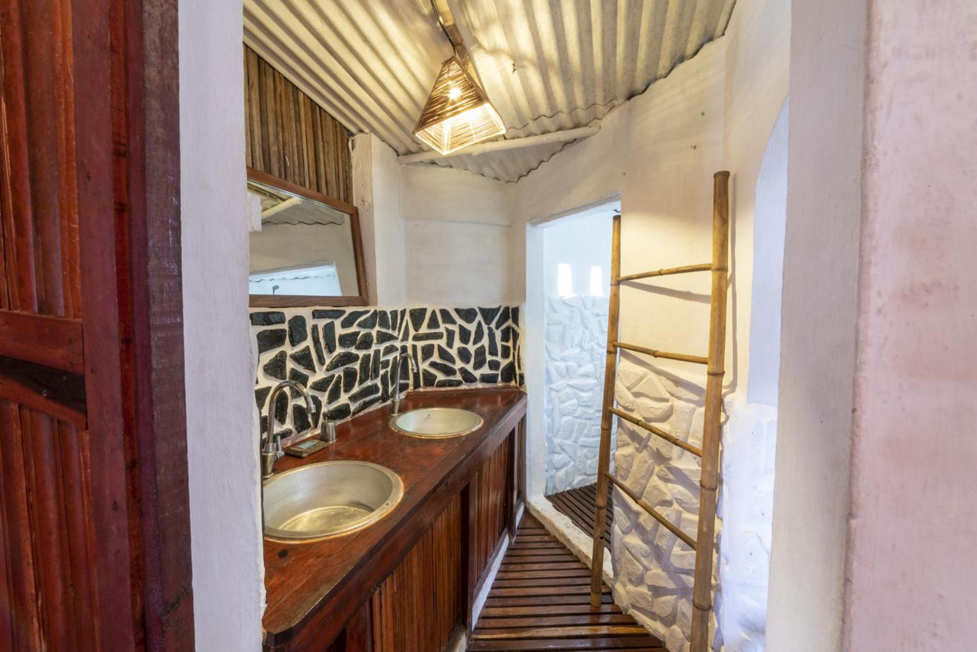Floraly Komba Hotel - Nosy Komba Rum bild